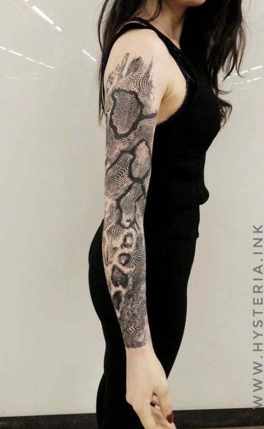 Snakeskin sleeve tattoo 