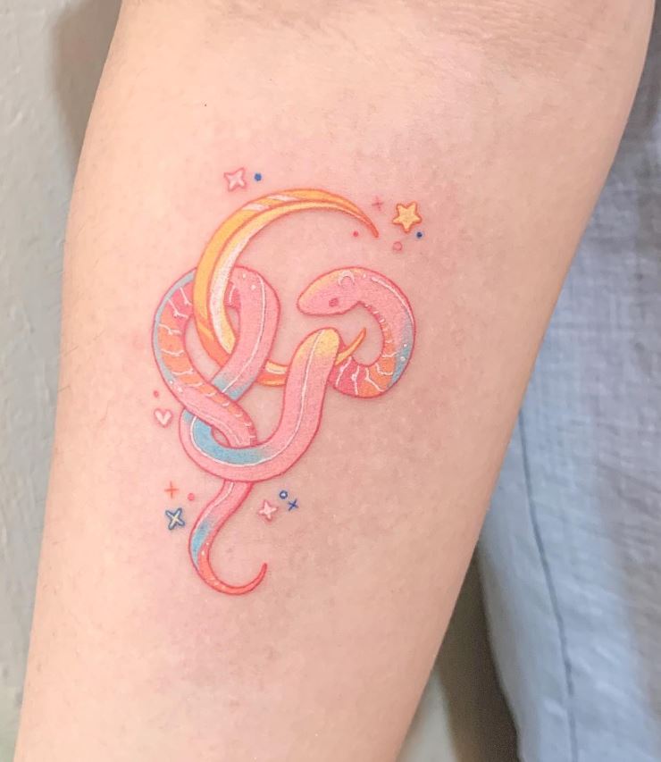 Pink snake tattoo on forearm 