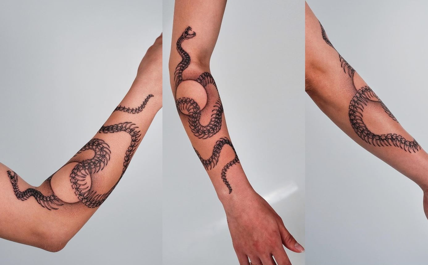 Snake and moon skeleton tattoo 