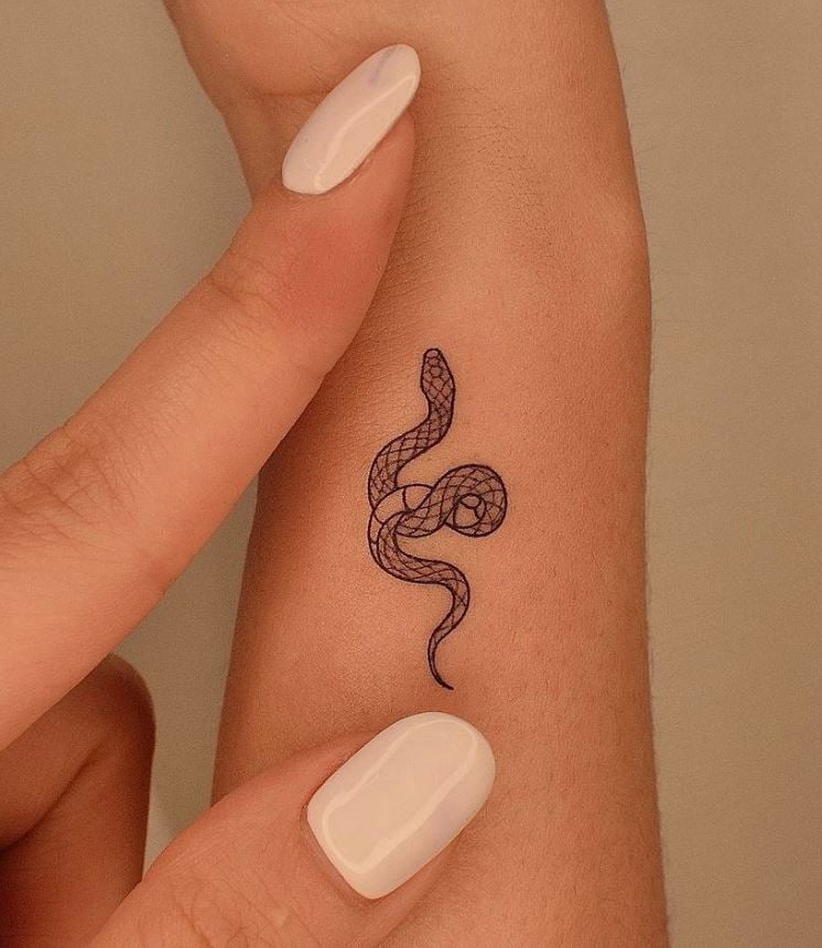 Mini snake wrist tattoo 