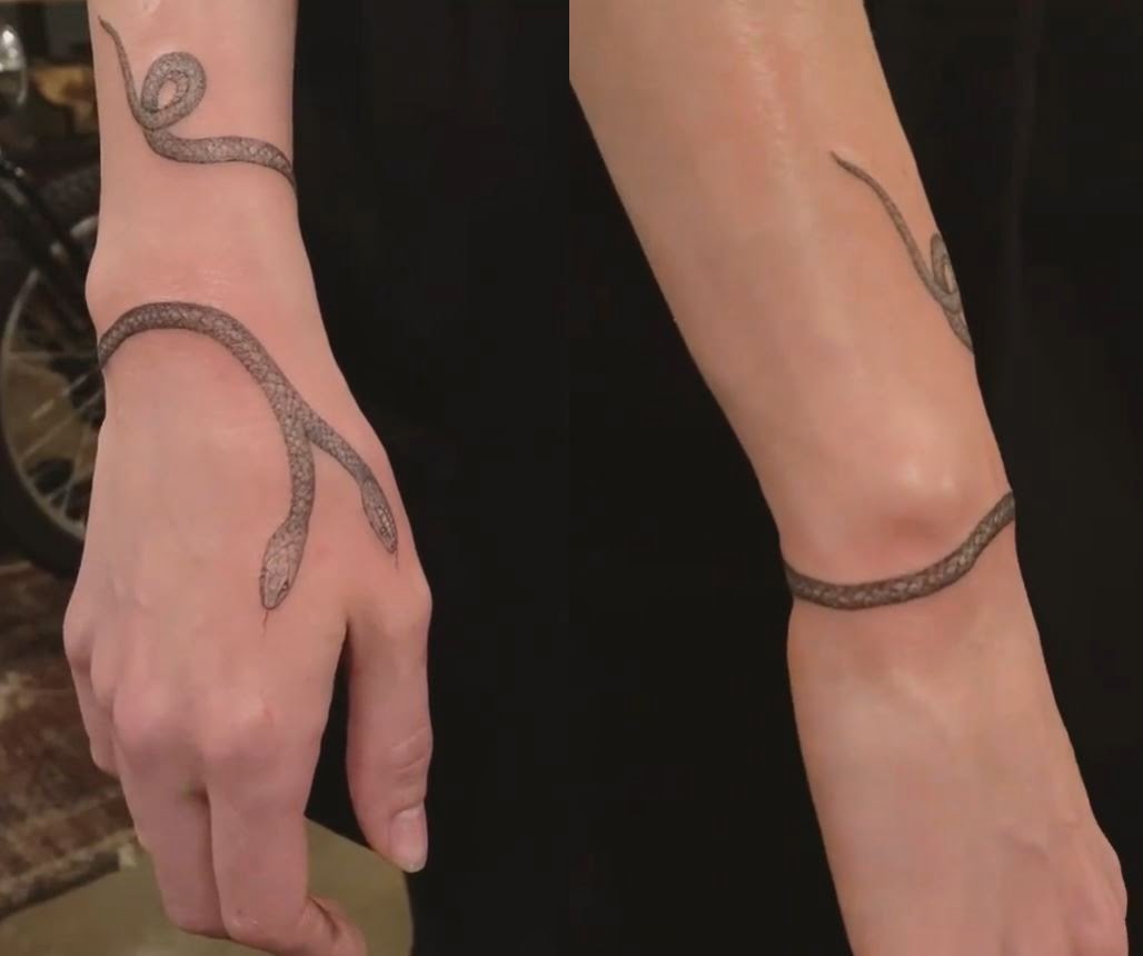 Two-headed snake tattoo on wrist 