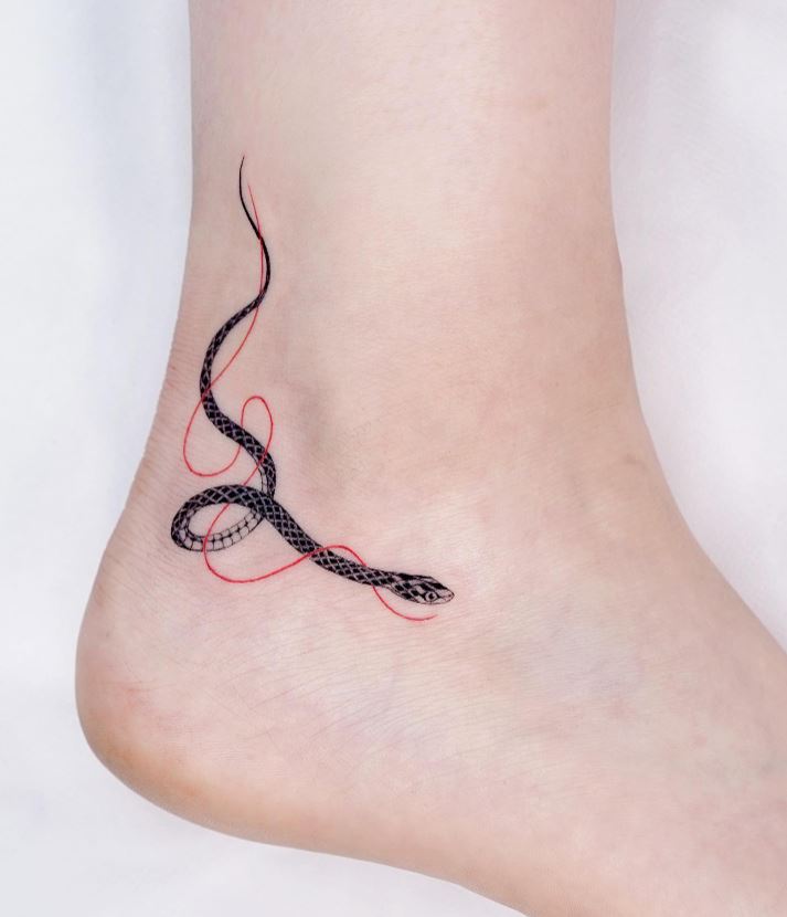 Minimalist snake ankle tattoo 