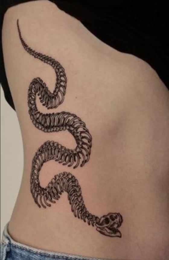 Coastal snake skeleton tattoo