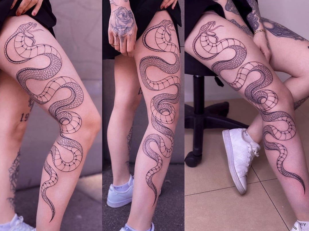 Cobra snake tattoo on thigh and leg 