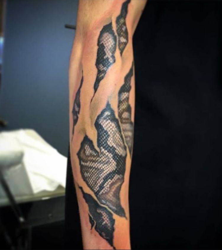 Shredded snake skin tattoo 