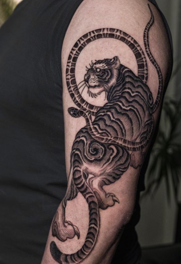 Snake and tiger tattoo