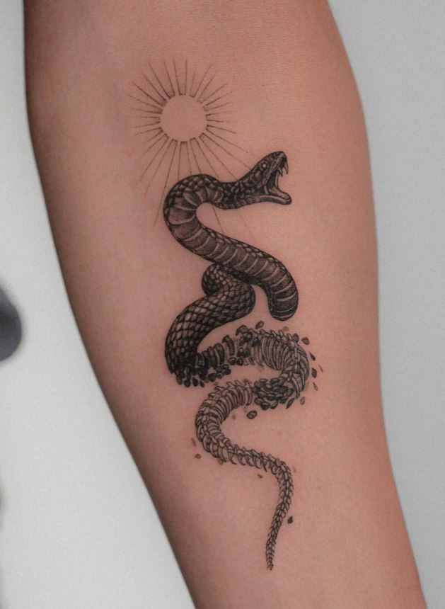 Black mamba snake tattoo 